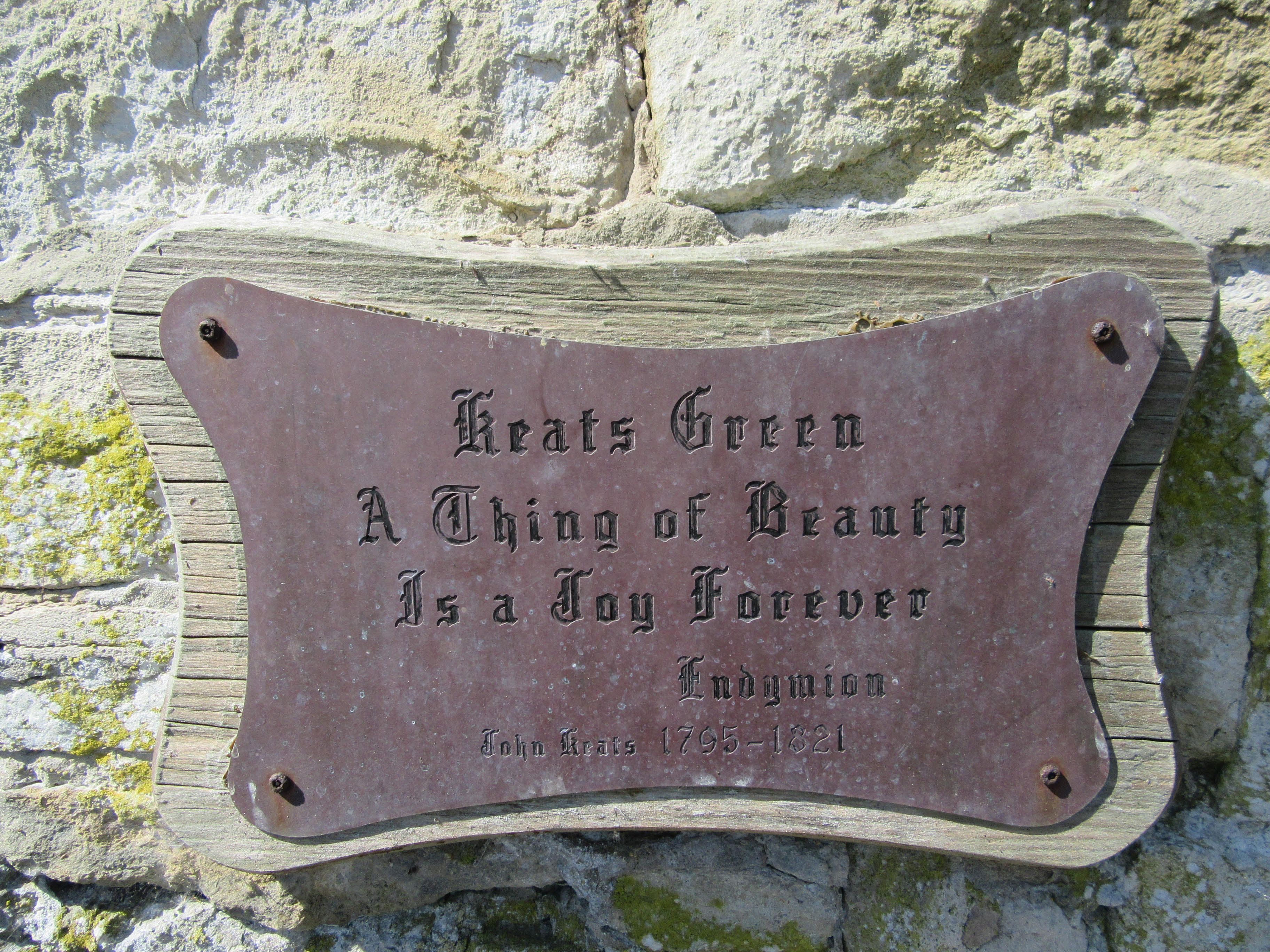 Plaque for Keats Green (south end), Shanklin, placed 1910. My thanks to the
        Shanklin & District Historical Society for this image. Click to enlarge.